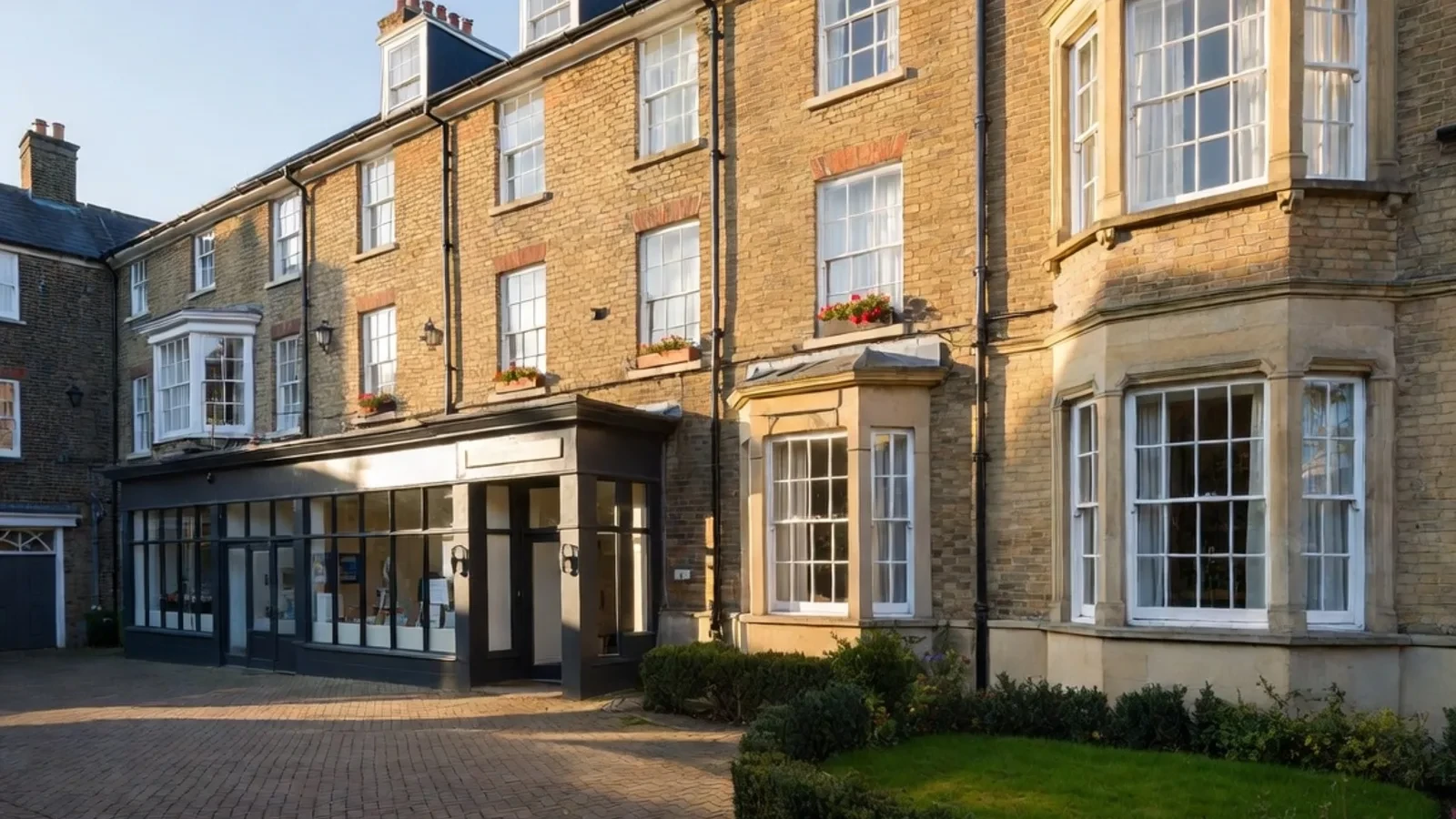 Traditional brick terraced houses with shopfronts