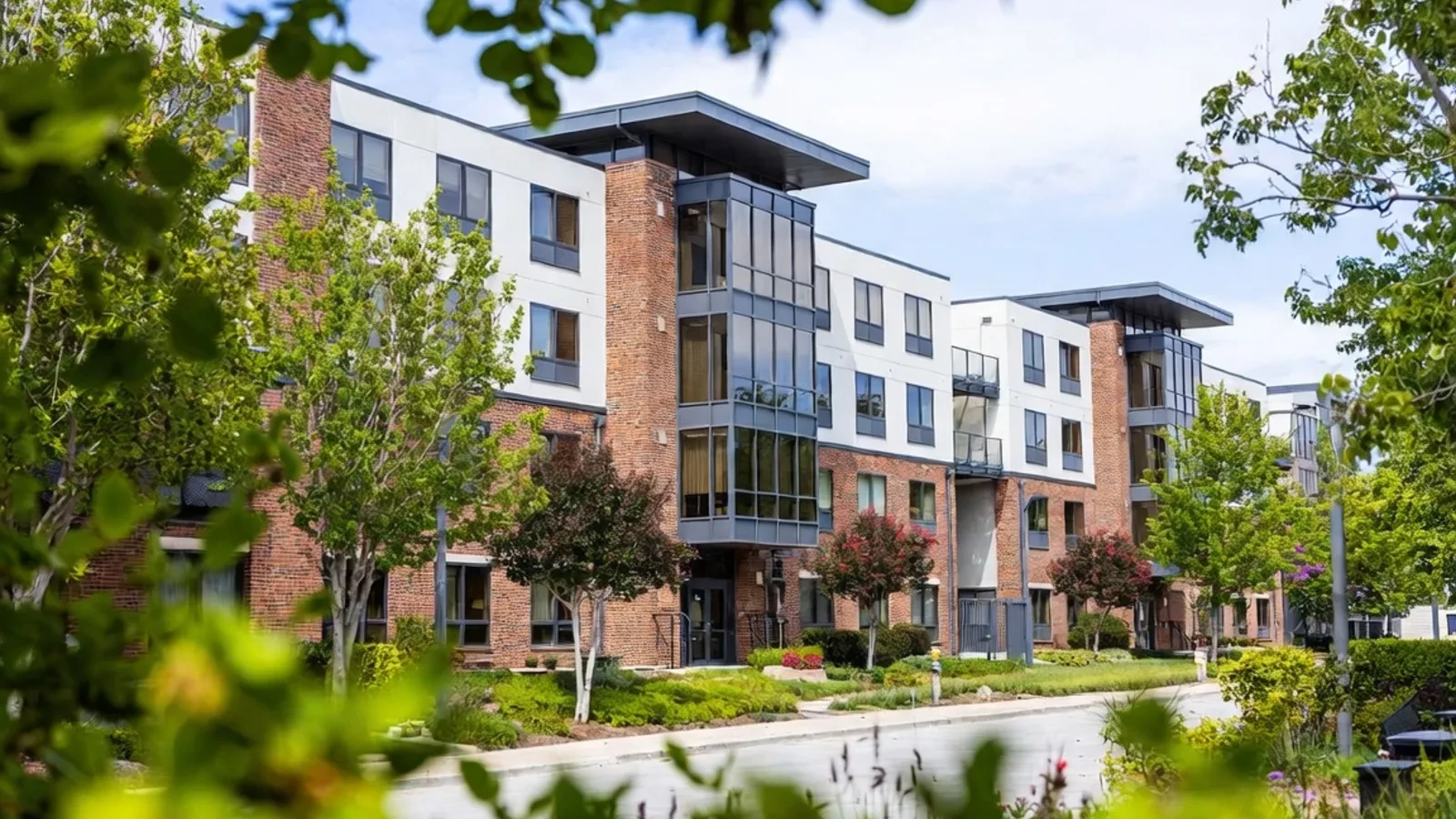 Well-kept residential apartment block with landscaped communal grounds